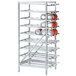 An Advance Tabco aluminum shelf rack with cans on it.