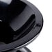 A black GET Melamine pedestal with a black bowl on top.