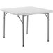 A speckled gray square plastic table with metal legs.