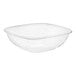 A Visions clear plastic square bowl with a curved edge.