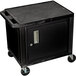 A black Luxor A/V cart with locking cabinet and wheels.