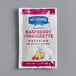 A white Hellmann's packet with red text for Raspberry Vinaigrette dressing.