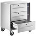 A silver stainless steel ServIt freestanding drawer warmer cabinet with wheels.