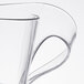 A close up of a Fineline clear plastic Tiny Tonics cup.