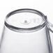 A close-up of a clear Fineline Tiny Tonics plastic cup.