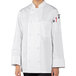 A person wearing a white Uncommon Chef Tempest Pro Vent long sleeve chef coat with a mesh back.