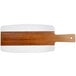An Acacia wood serving board with a brown and white marble stripe and wooden handle.