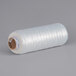 A roll of Lavex plastic stretch wrap on a gray surface.