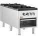 A stainless steel Cooking Performance Group Liquid Propane Stock Pot Range with three burners.