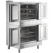 A Main Street Equipment double stainless steel convection oven with legs and doors.