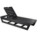 A black wooden chaise lounge chair by Highwood USA with a wooden frame.