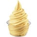 A bowl of yellow soft serve with a swirl on top.