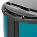 A black IRP Ice Hawk round barrel cooler on casters.