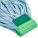 A blue Lavex microfiber tube mop with a green headband.