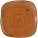 A white square TuxTrendz china plate with a brown and orange swirl design.