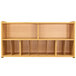 A wooden diaper wall storage with empty shelves.