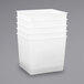 A stack of five white rectangular Tot Mate large opaque bins.