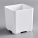 An American Metalcraft white square melamine jar with a square top on a gray background.