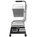 A Proluxe Vantage Clamshell Sandwich Grill with smooth plates and a handle.