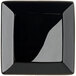 A glossy black square stoneware plate with a black border.
