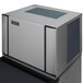 An Ice-O-Matic air cooled full cube ice machine with a stainless steel rectangular cabinet and vent.
