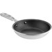 A black Vollrath Wear-Ever fry pan with a silver handle.