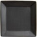 A black square Acopa stoneware plate with a black rim.