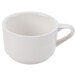 A white coffee cup with a handle.
