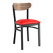 A black Lancaster Table & Seating chair with a red vinyl seat and wood back.