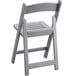 A grey Lancaster Table & Seating folding chair with a wooden slat seat.