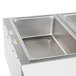 An APW Wyott stainless steel stationary steam table with sealed wells on a counter.