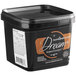 A black Satin Ice container with a white label for Satin Ice Dream 2 lb. Brown Bombshell Chocolate-Flavored Rolled Fondant.