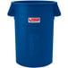 A blue plastic Suncast round trash can with a lid.