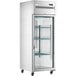 A large stainless steel Avantco reach-in refrigerator with glass doors and shelves on wheels.