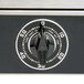 A close-up of a black and silver Nemco Countertop Pizza Oven dial.