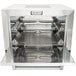 A Nemco stainless steel countertop pizza oven with racks inside.
