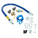 A blue Dormont gas connector kit with metal fittings and screws.