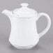 A Tuxton bright white ceramic teapot with a lid.