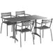 A Lancaster Table & Seating matte gray outdoor dining set with four chairs on a patio.