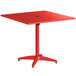 A red square Lancaster Table & Seating outdoor table with a metal base.