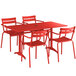 A red Lancaster Table & Seating outdoor dining table with four chairs and a red umbrella.