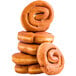 A stack of Rich's ready-to-finish yeast donuts on a white background.