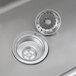 A silver stainless steel Regency multi-station hand sink with a drain.