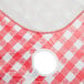 A red and white checkered Choice vinyl table cover with an umbrella opening.