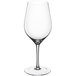 A close-up of a clear Della Luce Maia Bordeaux wine glass with a stem.