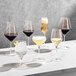 A group of Della Luce Astro red wine glasses on a table.