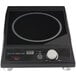 A black Spring USA induction range with a round knob.