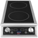 A Spring USA stainless steel double induction range on a counter.