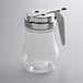 A clear polycarbonate teardrop syrup server jar with a silver lid.