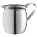 A Vollrath stainless steel bell creamer with a handle.